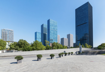 Obraz premium buildings with empty concrete square floor，Qianjiang New Town，hangzhou,china