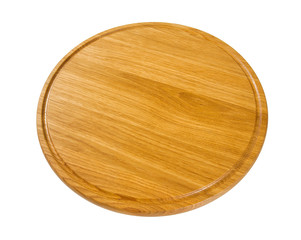 round wooden cutting board isolated on white