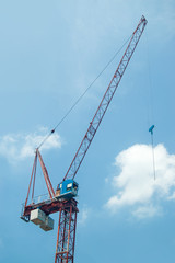 Crane on blue sky