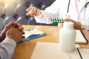 doctor explaining patient symptoms or asking a question