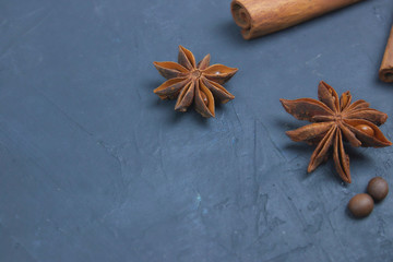 roasted coffee beans scattering in the corner of the background. beans on a dark background. view from above. copy space.