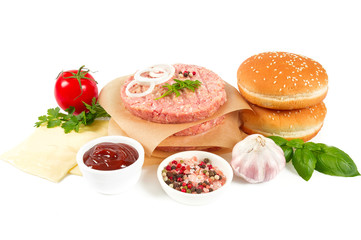 fresh raw burger patty isolated on white