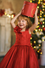 Little cute girl with gift box, xmas