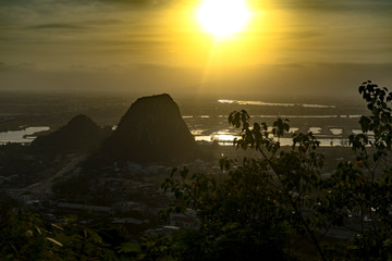 Beautiful sunset in the Marble mountains in Da Nang ,charming view for the city,jungle and sea,travel concept.