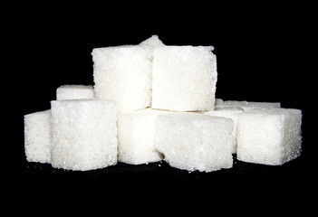 sugar isolated on black background