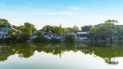 Fototapeta na wymiar The old house by the lake in Beijing, China
