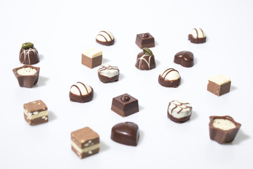 Many chocolates isolated in a white background