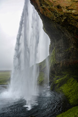 Fototapeta na wymiar Seljalandsfoss is one of the most famous waterfalls of Iceland