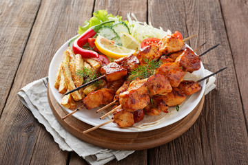 Chicken Shish kebab or shashlik, grilled meat skewers, traditional turkish dish, top view.