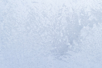 Obraz premium background ice, frozen window covered with frost, abstract silver texture, winter, cold