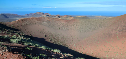 Volcanic landscape. Inside a volcano caldera crater. Timanfaya national park, Lanzarorte.