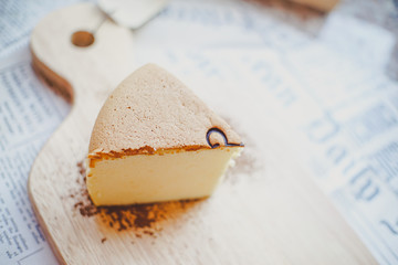 Top view of Fluffy Japanese Cheesecake on wood Chopping board.
