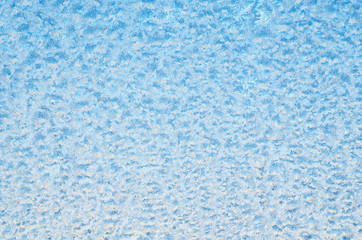 Fototapeta na wymiar Abstract frosty pattern on glass, background texture