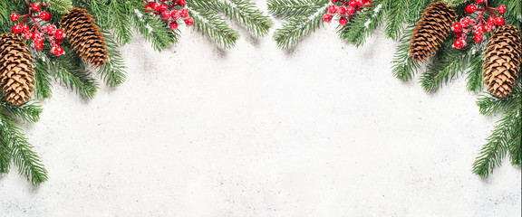 Fototapeta na wymiar Christmas flatlay background with fir tree brunch and red decora