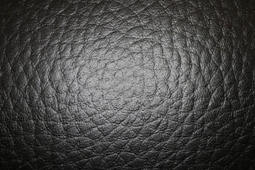 Black Leather texture background. Leather backdrop macro view.