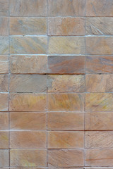 Wall of decorative stone plaques