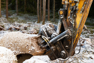 Closeup of excavator boom hydraulics