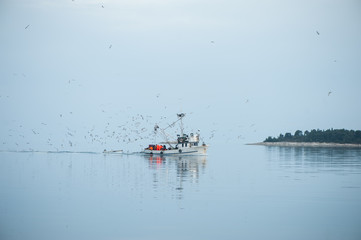 fishing boat on lake