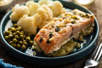 Solomon fillet with pineapple and cauliflower. Fish with vegetables.