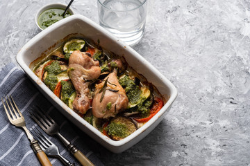 Ratatouille with chicken and pesto. French cuisine. Rosemary chicken with oven-roasted ratatouille.