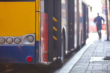 Public transportation / bus in urban surroundings on the street.