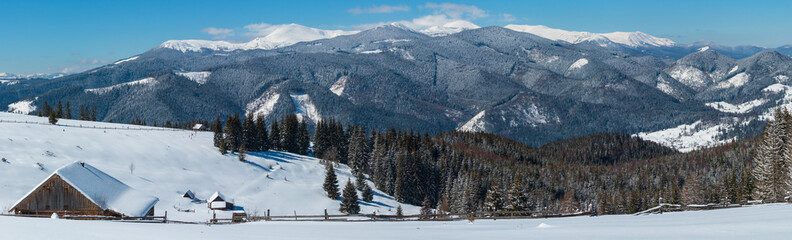 Winter snowy mountains, and lone farmstead