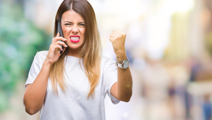 Young beautiful woman speaking calling using smartphone over isolated background annoyed and frustrated shouting with anger, crazy and yelling with raised hand, anger concept