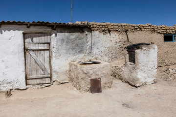 Old traditional house with stove in Bulunkul in Tajikistan