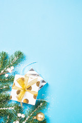 Christmas flatlay background - silver and gold decorations on bl