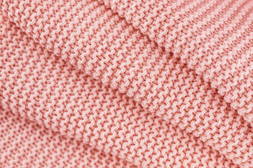 Knitted texture in Living Coral color of 2019.