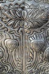 Thai style silver carving art on temple wall , Wat Srisuphan ,Chiang Mai, Thailand .