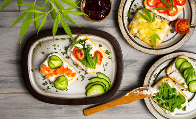 Sandwiches with marijuana leafs and vegetables