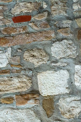 abstract stone background weathered powerful carved cobblestones white red brown cemented with cement