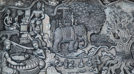 Thai style silver carving art on temple wall , Wat Srisuphan ,Chiang Mai, Thailand.