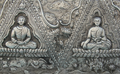 Thai style silver carving art on temple wall , Wat Srisuphan ,Chiang Mai, Thailand.