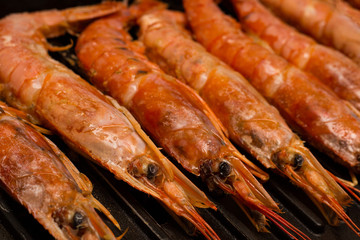 set large lobster seamless with head row of sea delicacies delicious appetizing snack close-up on grill background