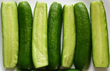 Fresh cut pickle spears waiting for the homemade brine 