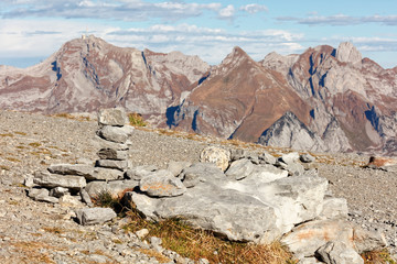 Cairn at Chäserrugg with Alpstein massif in background