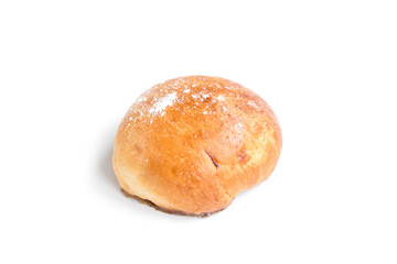 Baked bun with apple jam isolated on a white background.