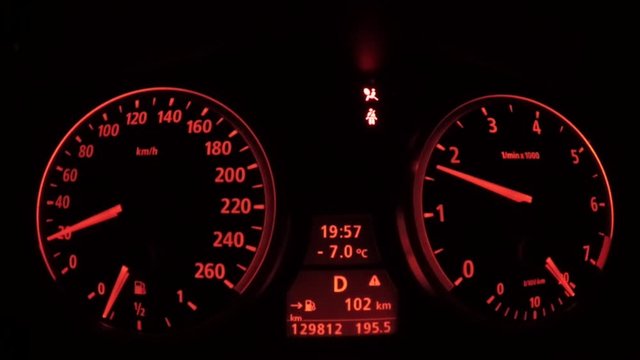 Dashboard of an expensive car in darkside