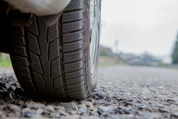 Obraz premium Car on asphalt road in spring morning