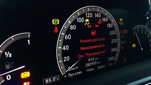 Dashboard of an expensive car in darkside