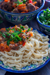Lagman cooked noodles, selective focus
