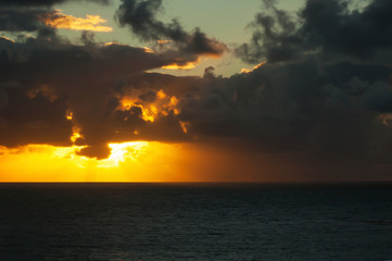 Sunset over the sea with sunbeams in the city of Trancoso. Bahia. Brazil.
