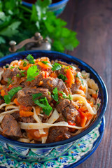 Laghman with beef and vegetables, selective focus