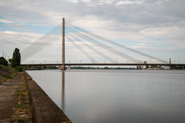 Fototapeta na wymiar Riga city, capital of Latvia panoramic view with river Daugava and cable bridge