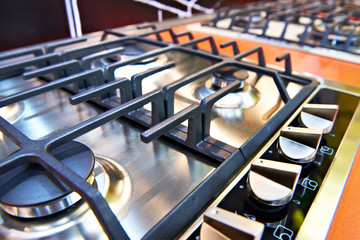 Modern gas stoves in store