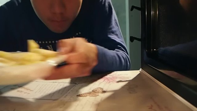 View From Microwave Oven Man Opens Door and Put Dish