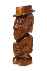 Fototapeta na wymiar A fabulous, exotic, unnatural wooden figure of a man in a hat. Isolated on white background.