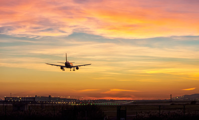 Fototapeta na wymiar Airport at sunset